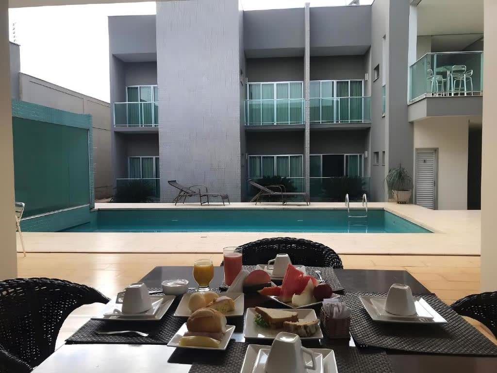 Outdoor pool with breakfast served poolside
